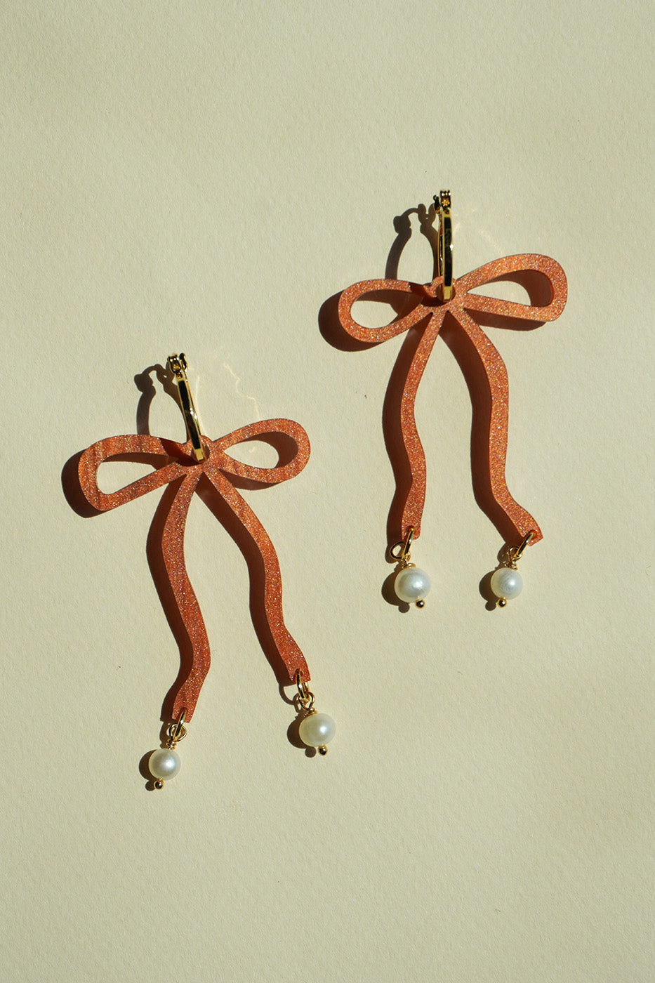 Bow Hoop Earrings in Copper