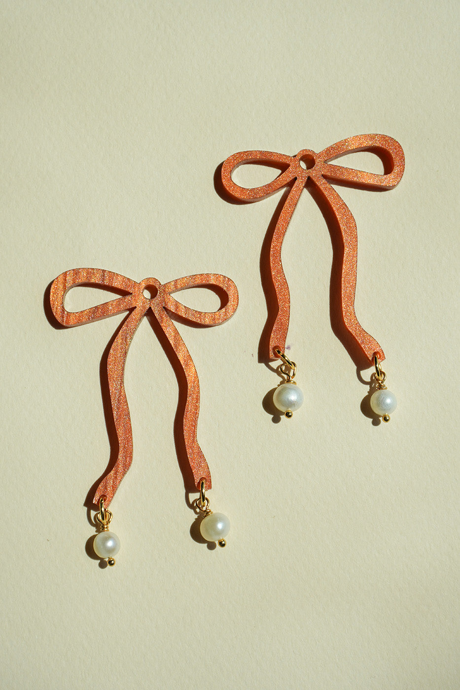 Bow Hoop Earrings in Copper