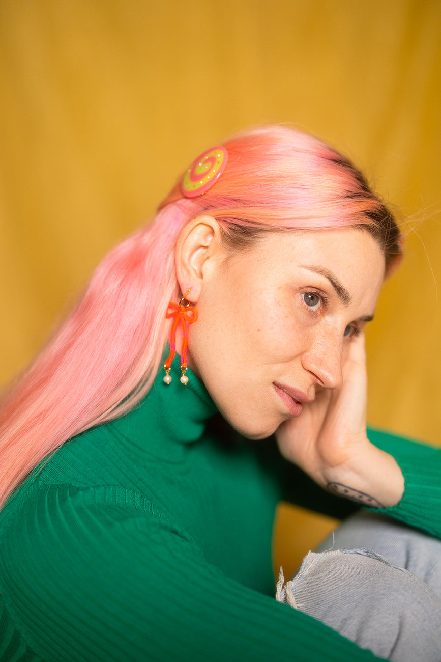 Bow Hoop Earrings in Neon Pink