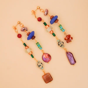 Colorful beaded necklace on a beige background